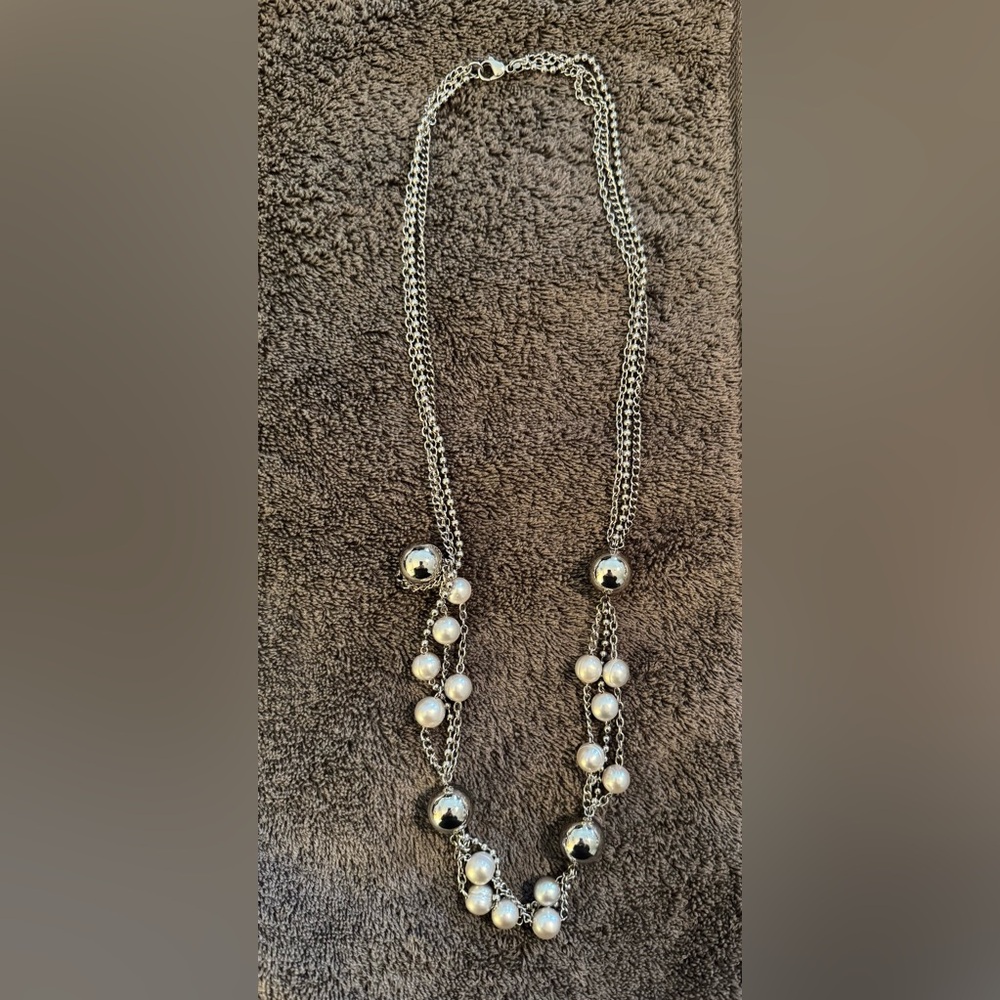 Silver and Pearl Necklace. Approximately 30 inches long.